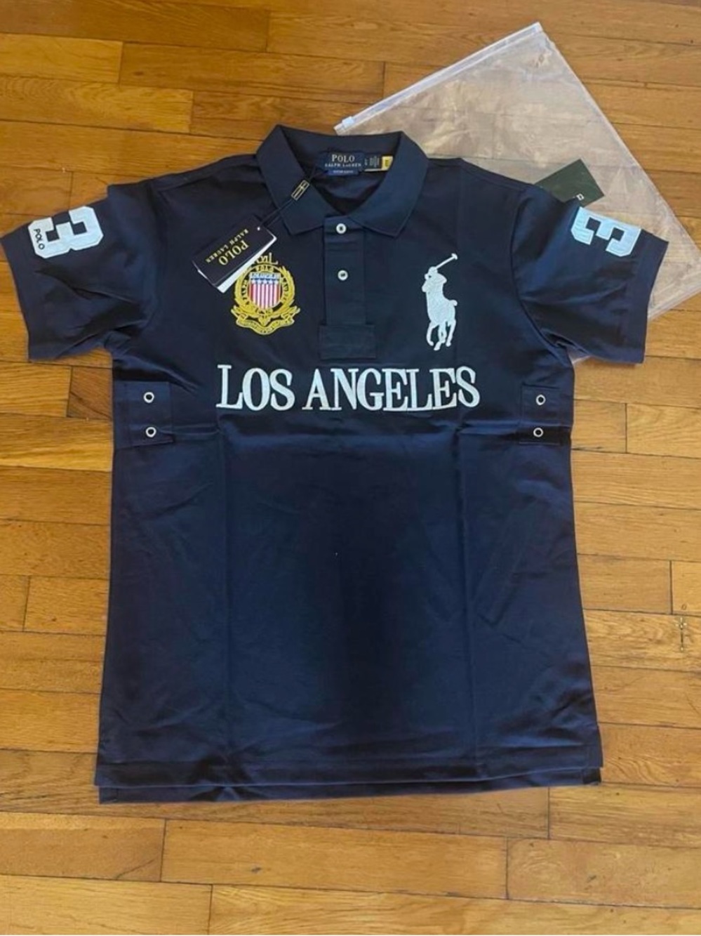 Ralph Lauren Navy Polo Shirt with White Logos and Gold Crest